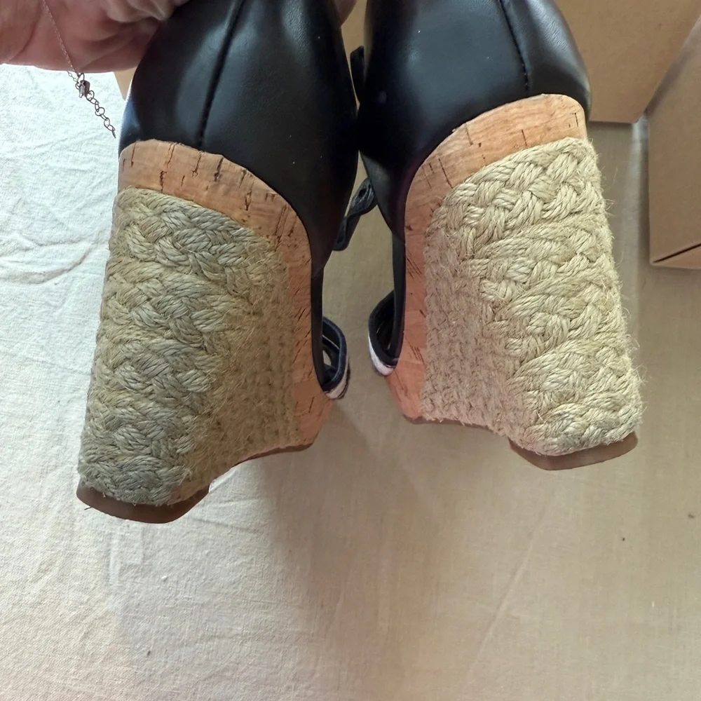 Cole Haan Black and White Air Tamsyn Wedge Sandal with Elegant Crisscross Design